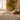Person sleeping peacefully in a modern bedroom, illustrating how quality sleep supports recovery, performance and overall health.